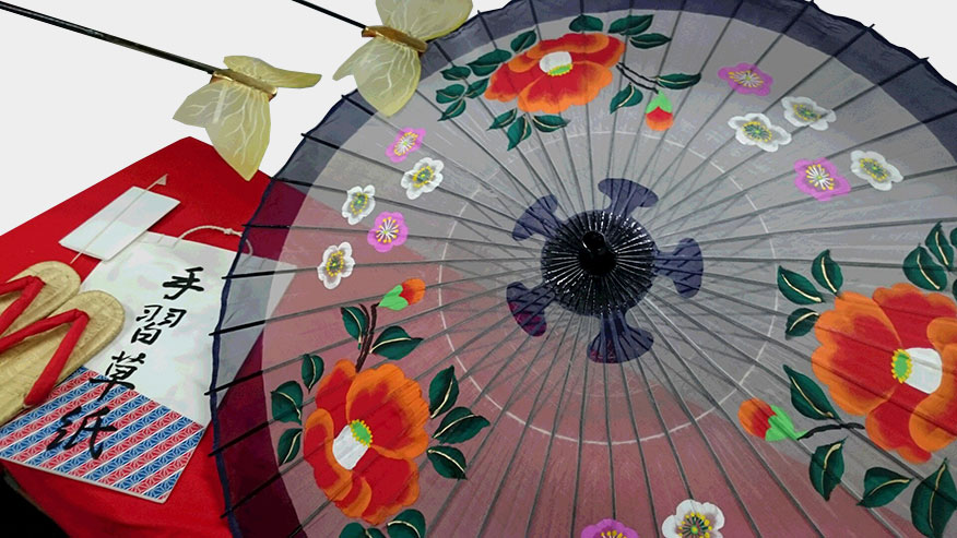 手習子(梅と椿の日傘・手習草紙・こより・懐紙・差し金蝶々(黄)・赤鼻緒の草履)